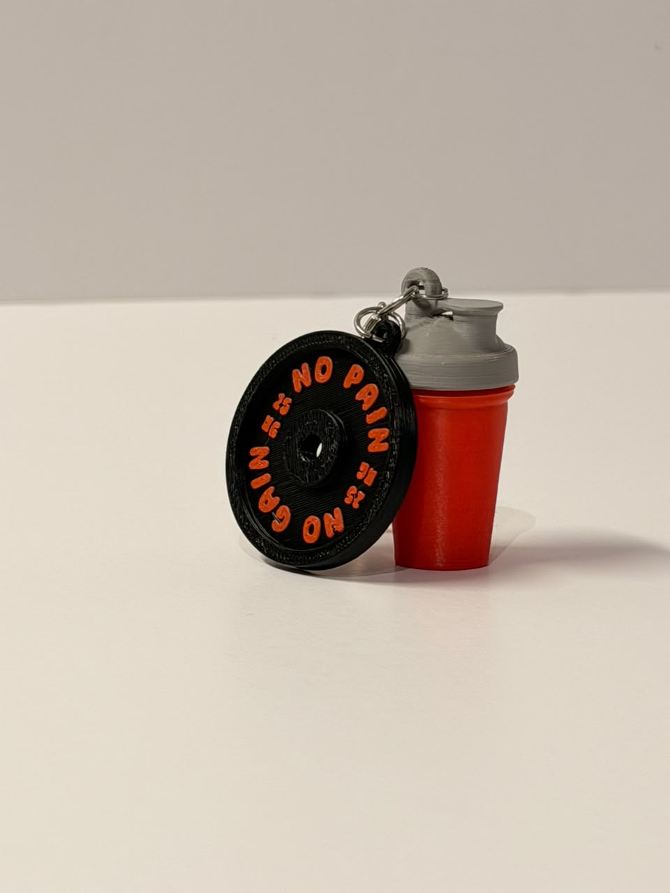 Red Shaker with a Black Plate Keychain