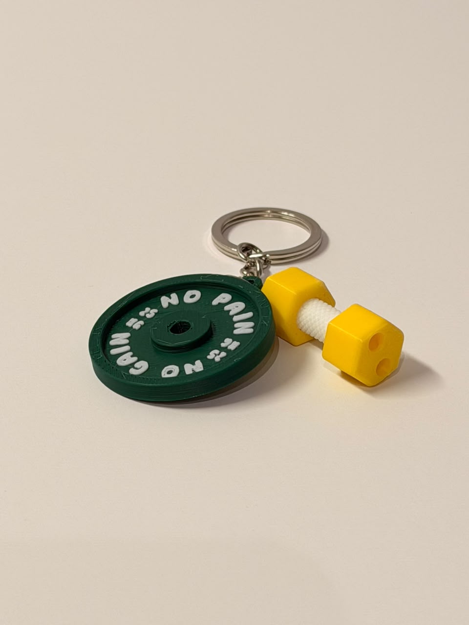 Yellow Dumbell with a Green Plate Keychain